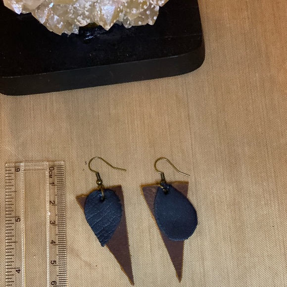 Jewelry - Leather up cycle earrings.